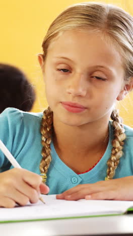 School-kids-studying-in-classroom