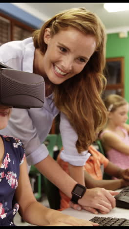 Schoolgirl-using-virtual-reality-glasses-in-classroom