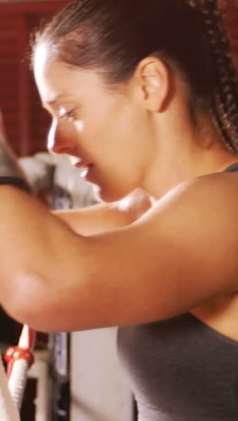 Tired-female-boxer-standing-in-the-ring