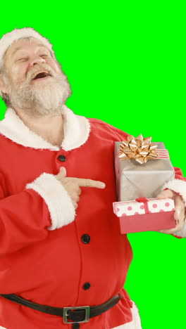 Santa-claus-holding-a-gift-box