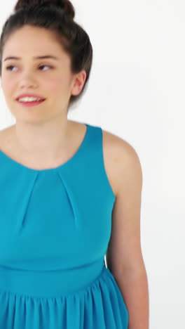 Woman-holding-shopping-bag-against-white-background