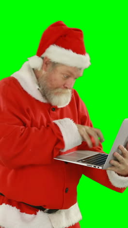 Weihnachtsmann-Mit-Laptop