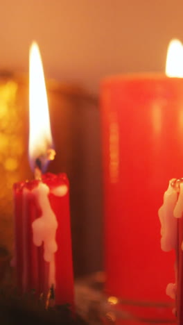 Close-up-of-candles-burning