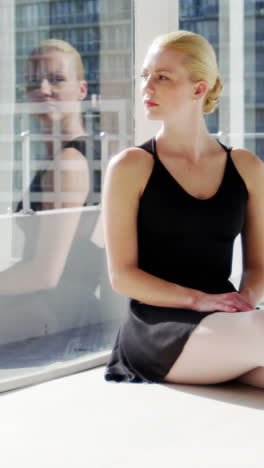 Ballerina-relaxing-in-studio