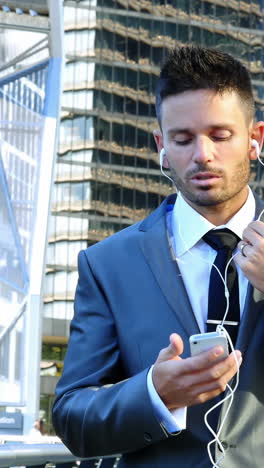 Businessman-talking-on-mobile-phone