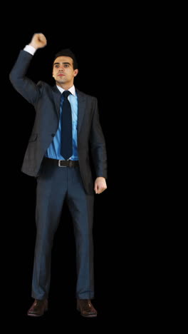 Businessman-gesturing-against-black-background