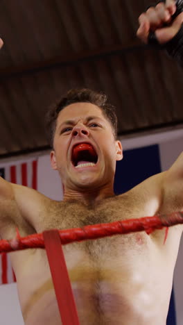 Excited-male-boxer-posing-after-victory