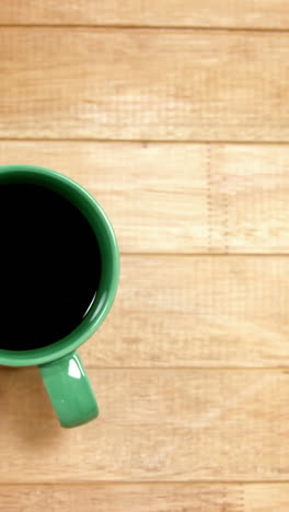 Close-up-of-green-coffee-cup