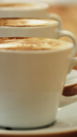 Close-up-of-various-coffee-cup-with-saucer