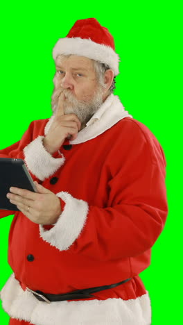 Weihnachtsmann-Mit-Digitalem-Tablet