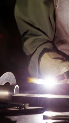 Welder-welding-a-metal