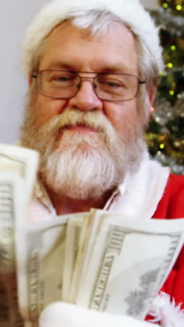 Santa-claus-counting-currency-notes