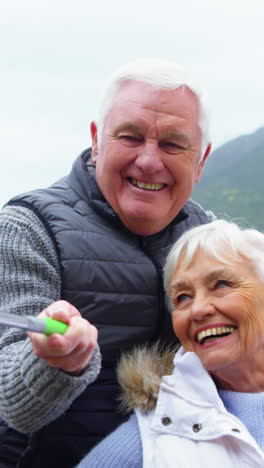 Senior-couple-taking-a-selfie-from-selfie-stick