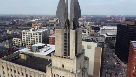 Passing-Over-the-Times-Square-Building-in-Rochester,-New-York