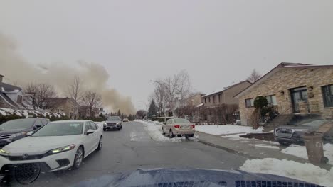 Smoke-plume-from-building-fire-seen-from-dashcam-view