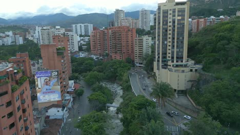 Aerial-View-Over-Rio-Cali-And-Colombia-Avenue-at-Sunset