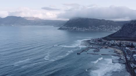 Aerial-coastal-town-harbour,-Kalk-Bay-Cape-Town-4K