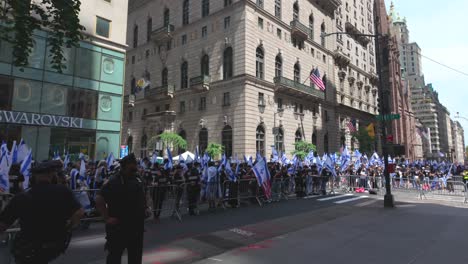 A-street-level-view-of-the-Israel-Day-Parade-in-New-York-City-on-a-sunny-day