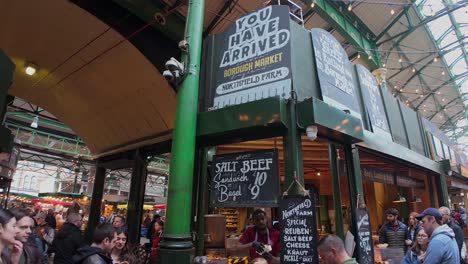 Looking-up-at-the-Borough-market-sign,-London