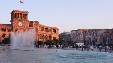 Fountains-spray-at-golden-hour-Republic-Square-in-Yerevan,-Armenia