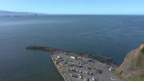 The-natural-harbor-at-the-north-end-of-Port-Orford-Bay-has-one-of-only-two-“dolly-docks”-in-the-US-and-six-in-the-world,-where-boats-are-lifted-in-and-out-of-the-water-by-huge-cranes