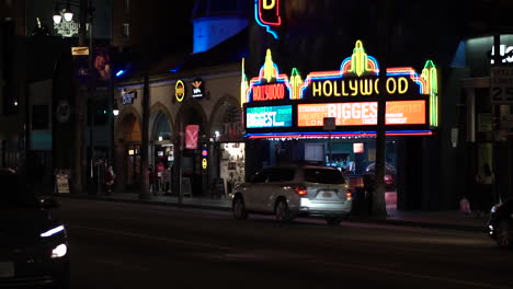 Los-Angeles-USA,-Night-Traffic-on-Hollywood-Boulevard,-Slow-Motion