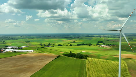 Aerial-footage-captures-a-serene-rural-landscape-dotted-with-wind-turbines