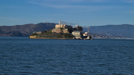 Alcatraz-Island-and-Federal-Prison-on-Sunny-Day,-View-From-San-Francisco-Bay-Ferry