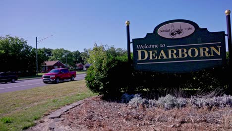 Welcome-to-Dearborn,-Michigan-sign-with-video-panning-right-to-left-close-up