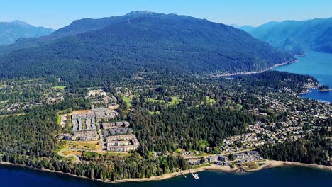 Neighbourhoods-and-Mountains-of-North-Vancouver-near-Deep-Cove-on-the-Burrard-Inlet-in-BC-Canada---Aerial-Helicopter-View