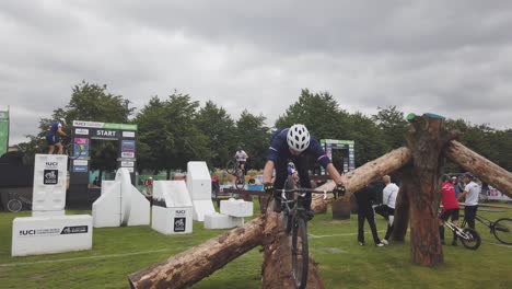 A-group-of-riders-practising-on-a-log-of-wood