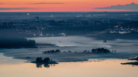 Timelapse-of-a-fog-covering-islands-in-a-nature-reserve,-dawn-in-Viikki,-Helsinki