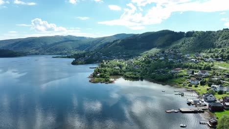 Arna-and-Garnes-outside-Bergen-Norway,-Aerial-above-sorfjorden-sea