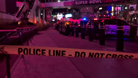 Police-Line-Do-Not-Cross-Tape-on-Sidewalk-of-Las-Vegas-Strip-With-Police-Cars-on-Crime-Scene