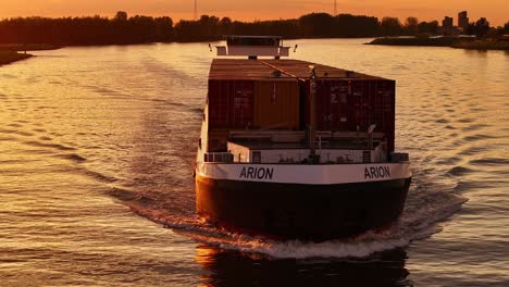 Impressive-Arion-Bulk-carrier-sailing-gracefully-along-Noord-River,-slow-mo