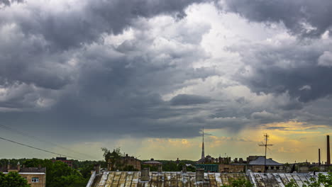 Time-lapse-grey-clouds-formation-over-city-buildings-skyline,-incoming-storm