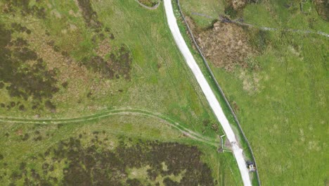 Narrow-trails-are-adjoining-an-automobile-road-in-the-wilderness