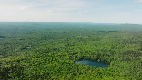 Drone-footage-of-New-Hampshire-looking-at-a-lake