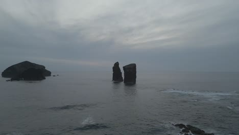 Stacks-front-of-Mosteiros-beach-on-cloudy-day,-Ponta-Delgada-on-Portuguese-island-of-Sao-Miguel-in-Azores