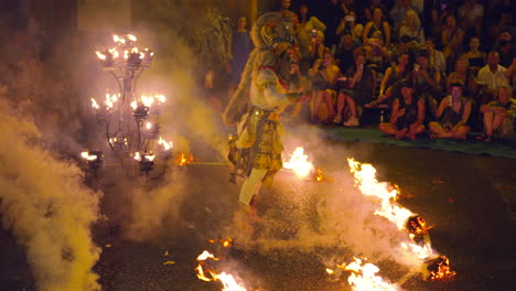 Tari-Kecak-Fire-Dance-Show---Monkey-Jumps-and-Throws-Flaming-Deadwood-in-the-Air-at-JI