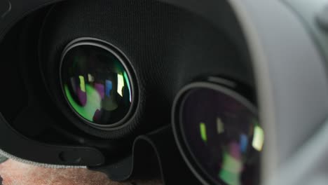 Close-up-light-reflect-off-of-lenses-inside-a-virtual-reality-VR-headset