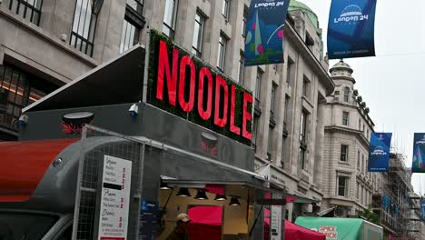 Get-yourself-a-Noodle-in-Regents-Street-before-the-UEFA-Champions-League-in-Wembley,-London,-United-Kingdom