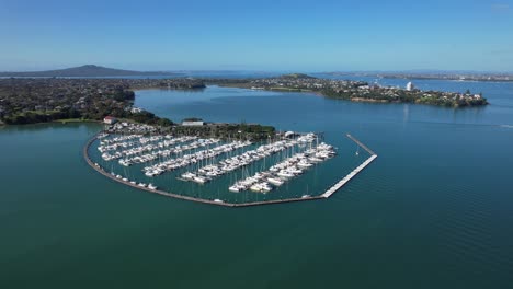 Bayswater-Marina-With-Moored-Yachts-And-Sailboats-In-Auckland,-New-Zealand---Aerial-Shot