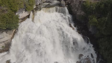 Cascading-waterfall-in-Owen-Sound,-Canada-captured-from-an-aerial-perspective