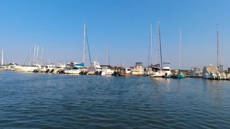 Tranquil-footage-of-luxury-sailing-and-motorized-yachts-boats-moored-in-a-marina-in-a-harbour-in-Durban-point-royal-yacht-club