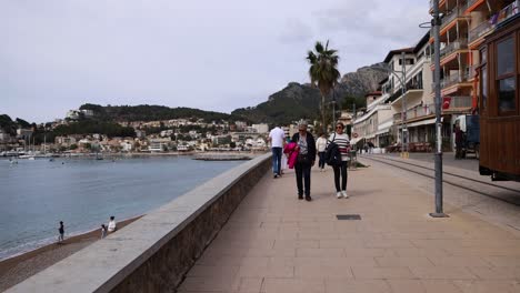 Promenade-At-Port-Soller-Harbor-In-Mallorca,-Spain---Panning-Shot