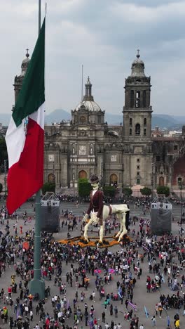 Day-of-the-Dead-in-capital's-main-square-in-CDMX,-with-Metropolitan-Cathedral-background,-vertical-mode