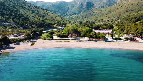 Incredible-aerial-views-of-a-beautiful-beach-on-the-Costa-Brava,-perfectly-captured-by-a-moving-drone