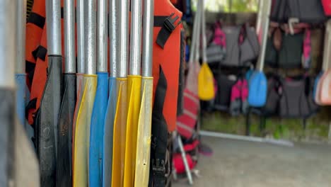 Paddles-and-life-jackets-displayed-for-kayakers-are-necessary-and-mandatory