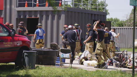 Firefighters-training-at-a-facility-in-Siloam-Springs,-Arkansas,-on-a-sunny-day